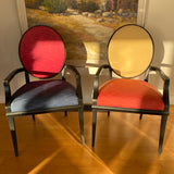 Set of 8 Roche Bobois dining chairs with black frames and multi color upholstery