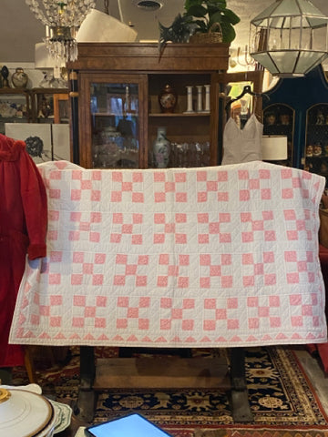 pink and white quilt