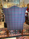 pair of plaid wing back chairs