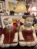 pair of carved Asian figures