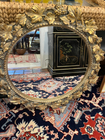 round gilt leaf and grape mirror