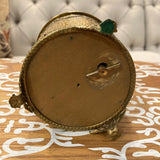 Round brass music box