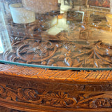 carved Indian teak table with glass top