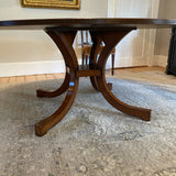 Beautiful Regency style round wood pedestal table with brass detail