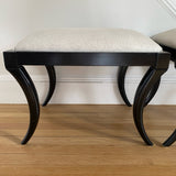 pair of ottamans by Oli with hide upholstery