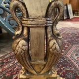 Pair of gilt based pedestals with swan carvings