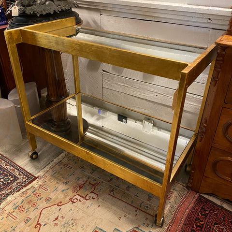 Gold and mirrored bar cart