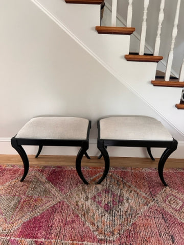 pair of ottamans by Oli with hide upholstery