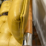 pair of chrome and yellow counter stools