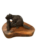 Bronze beaver sculpture on wood base signed Lowell Davis