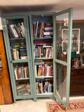 Tall green glass front cabinet