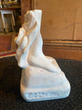 alabaster sculpture of feet