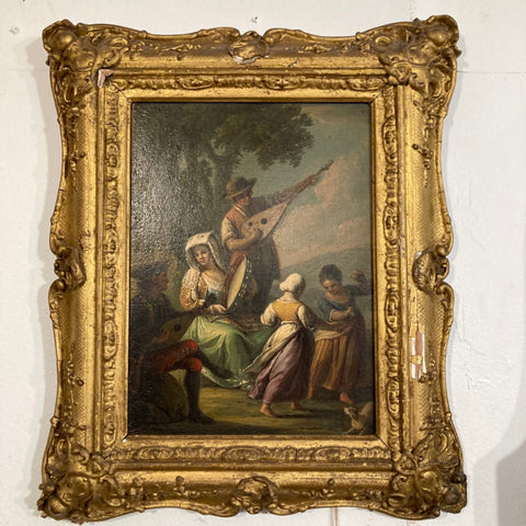 small oil painting in gilt frame of man and woman playing music and dancers