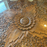 carved Indian teak table with glass top