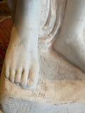 alabaster sculpture of feet