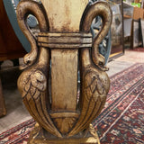 Pair of gilt based pedestals with swan carvings