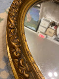 oval gilt mirror