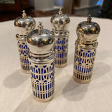 set of 4 Neiman Marcus plated salt and peppers