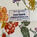 Camel back sofa custom upholstered in silk floral fabric and down cushions