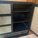 Crate and Barrel black caned chest of 3 drawers and 1 door