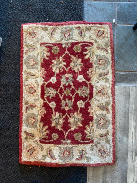 Small Red And Ivory Floral Rug