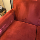 red upholstered Crate and Barrel sofa