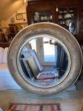 large round mirror with fish scale pattern