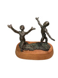 Nine Bronze Dancers By Sue Eisenberg