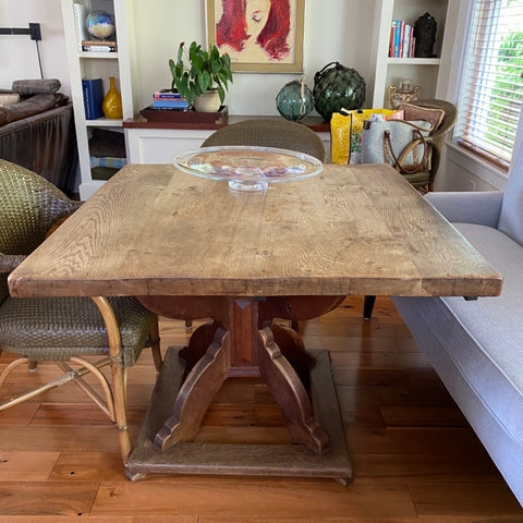 square rustic dining table with center pedestal