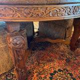 carved Indian teak table with glass top