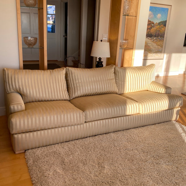 Two toned beige striped upholstered couch