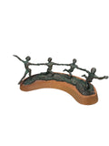 Nine Bronze Dancers By Sue Eisenberg