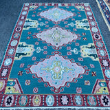 green and red kilim rug