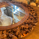 Black Forest carved wood mirror oval