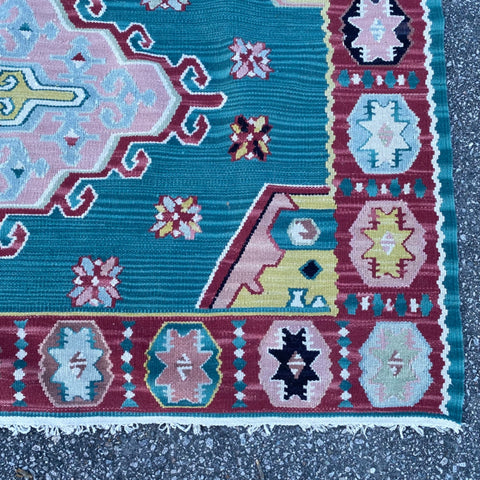 green and red kilim rug