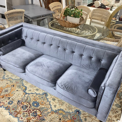 Blue gray velvet tuffed couch