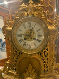 gilded garniture set clock and two candleabras
