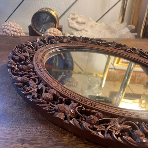 Black Forest carved wood mirror oval