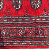 Traditional Red Rug with Fringe Detail