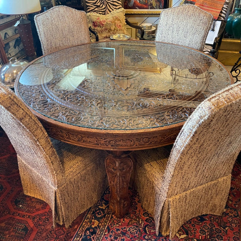 carved Indian teak table with glass top