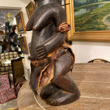 carved African man sculpture