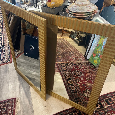 Pair of gold fluted mirrors