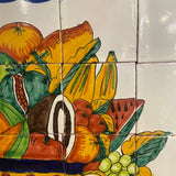 Italian tile wall hanging of fruit in a bowl